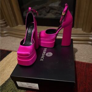 Versace heels size 7 1/2 but fits like a size 7